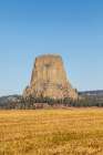 Devils Tower National Monument, a rare form of igneous rock, rises out of the Wyoming landscape. Art Print